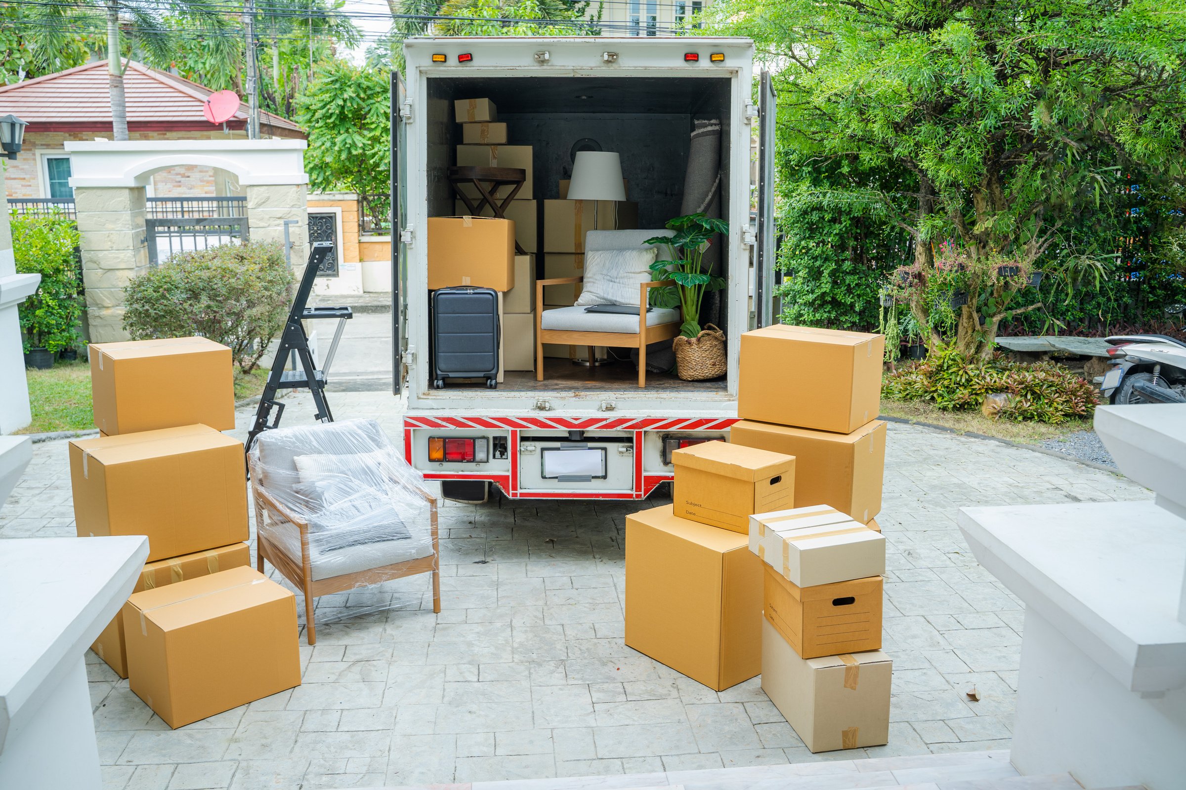 House moving service,Boxes waiting to be moved into a new home.